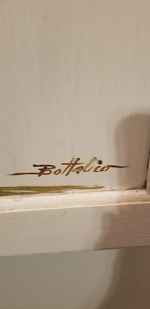 signature on iron board cabinet