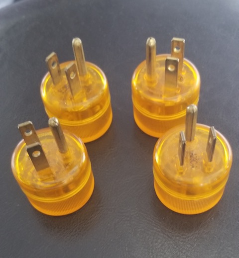 4 orange 3 prong plugs